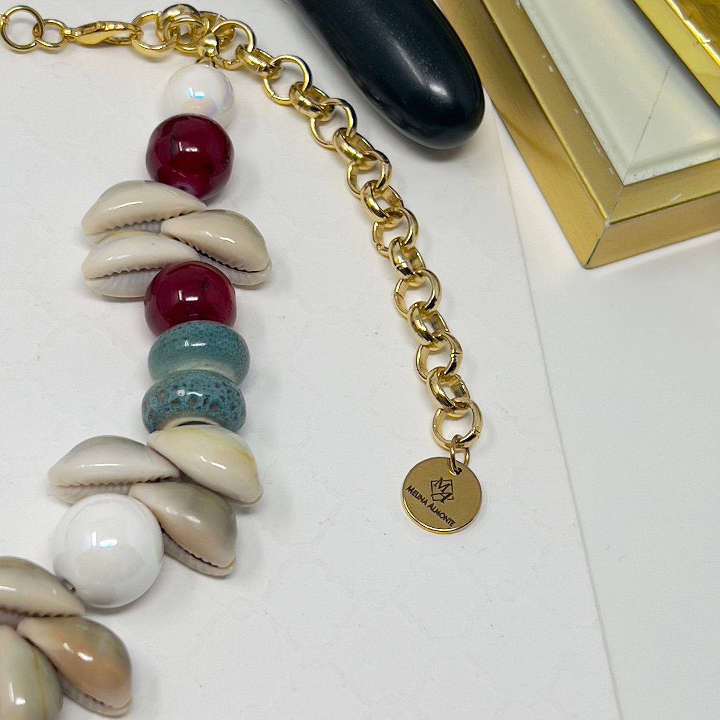 Handmade Cowrie Shell Necklace with Ceramic Beads and Gold Plated Conch Pendant – Adjustable Boho Beach Jewelry