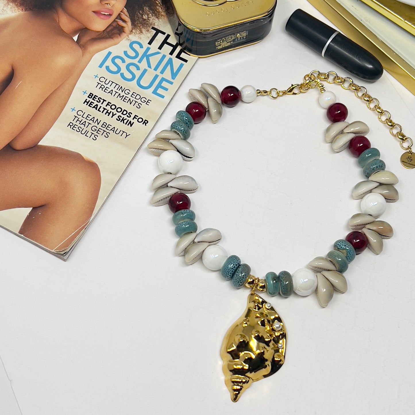 Handmade Cowrie Shell Necklace with Ceramic Beads and Gold Plated Conch Pendant – Adjustable Boho Beach Jewelry