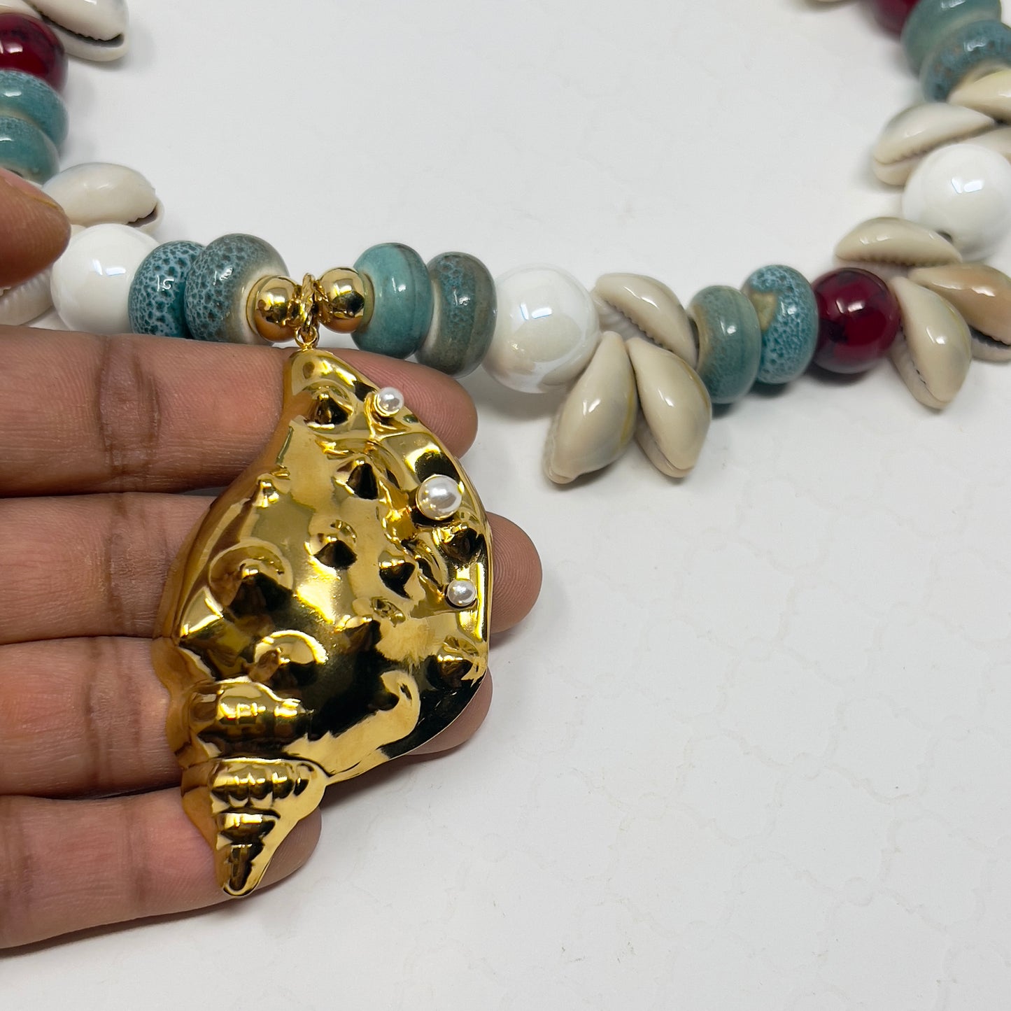 Handmade Cowrie Shell Necklace with Ceramic Beads and Gold Plated Conch Pendant – Adjustable Boho Beach Jewelry