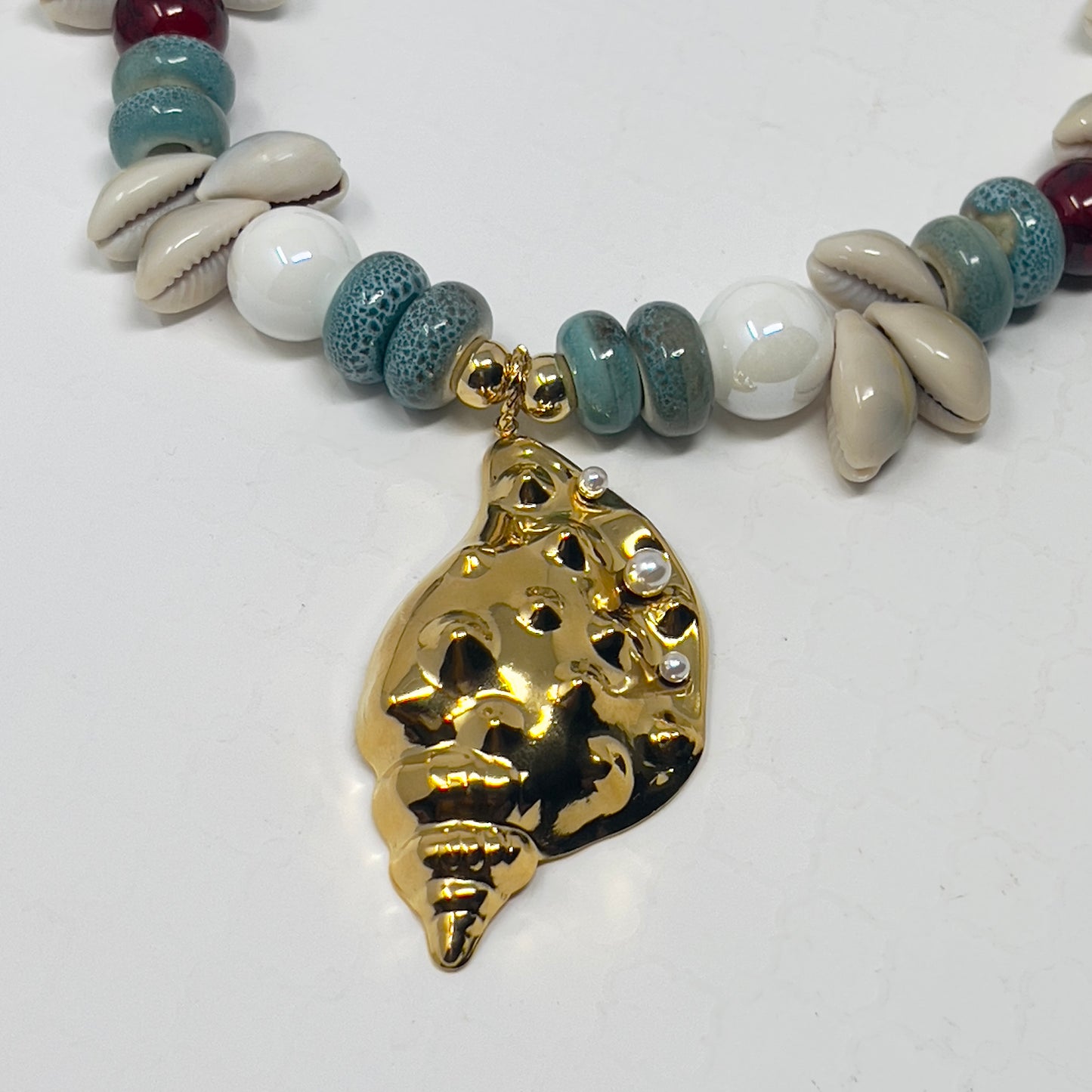 Handmade Cowrie Shell Necklace with Ceramic Beads and Gold Plated Conch Pendant – Adjustable Boho Beach Jewelry