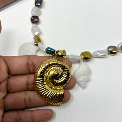Handmade necklace of baroque pearls and Austrian crystals with gold-plated snail Pendant in stainless steel