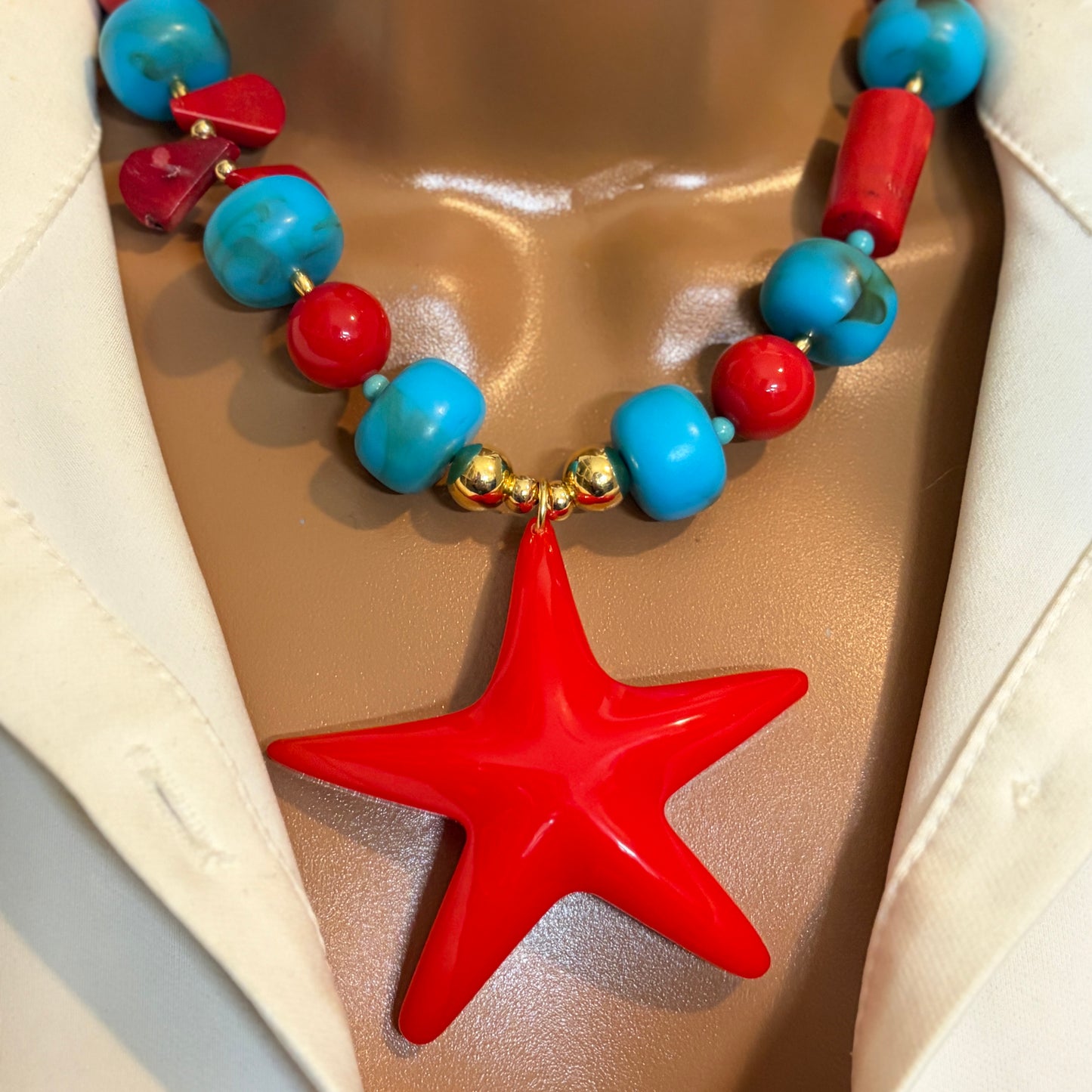 Handmade starfish necklace with resin beads and natural coral