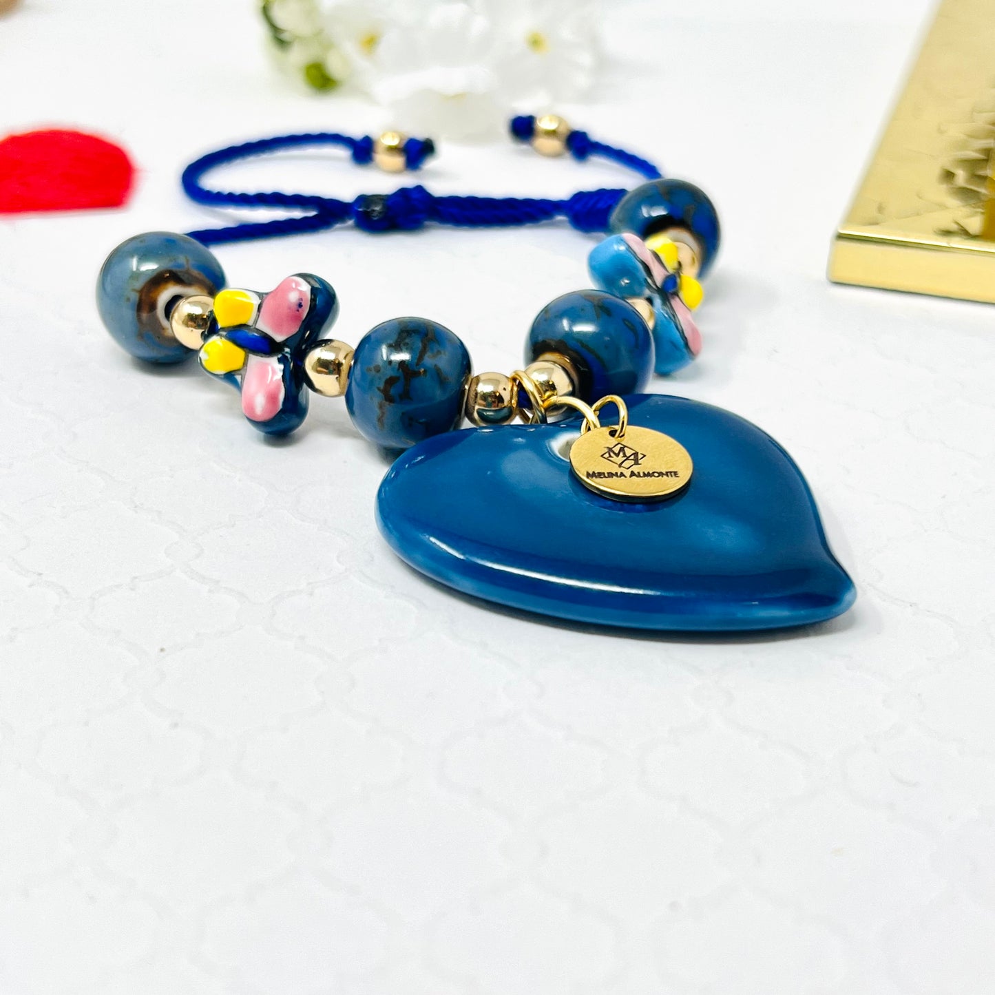 Ceramic Bead Bracelet With Ceramic Heart And Butterfly Pendant
