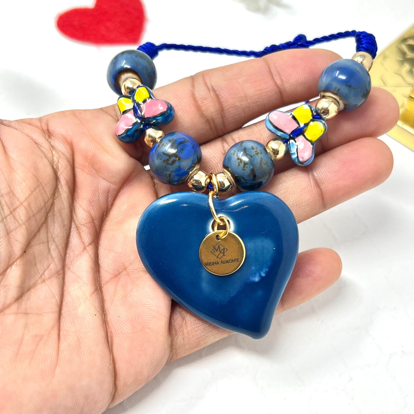 Ceramic Bead Bracelet With Ceramic Heart And Butterfly Pendant