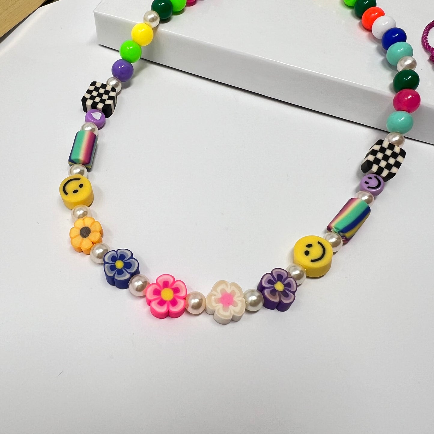 Colorful bead flower necklace, polymer clay pendant, happy face, chunky beaded necklace