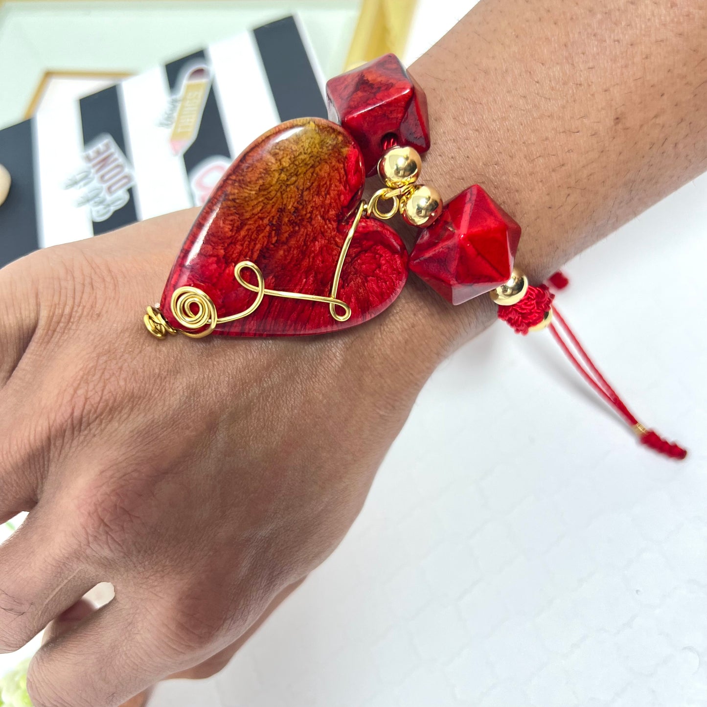 Red heart bracelet with gold plated beads woven macramé