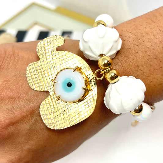 Gold plated elephant charm bracelet with ceramic and gold plated beads woven in macrame