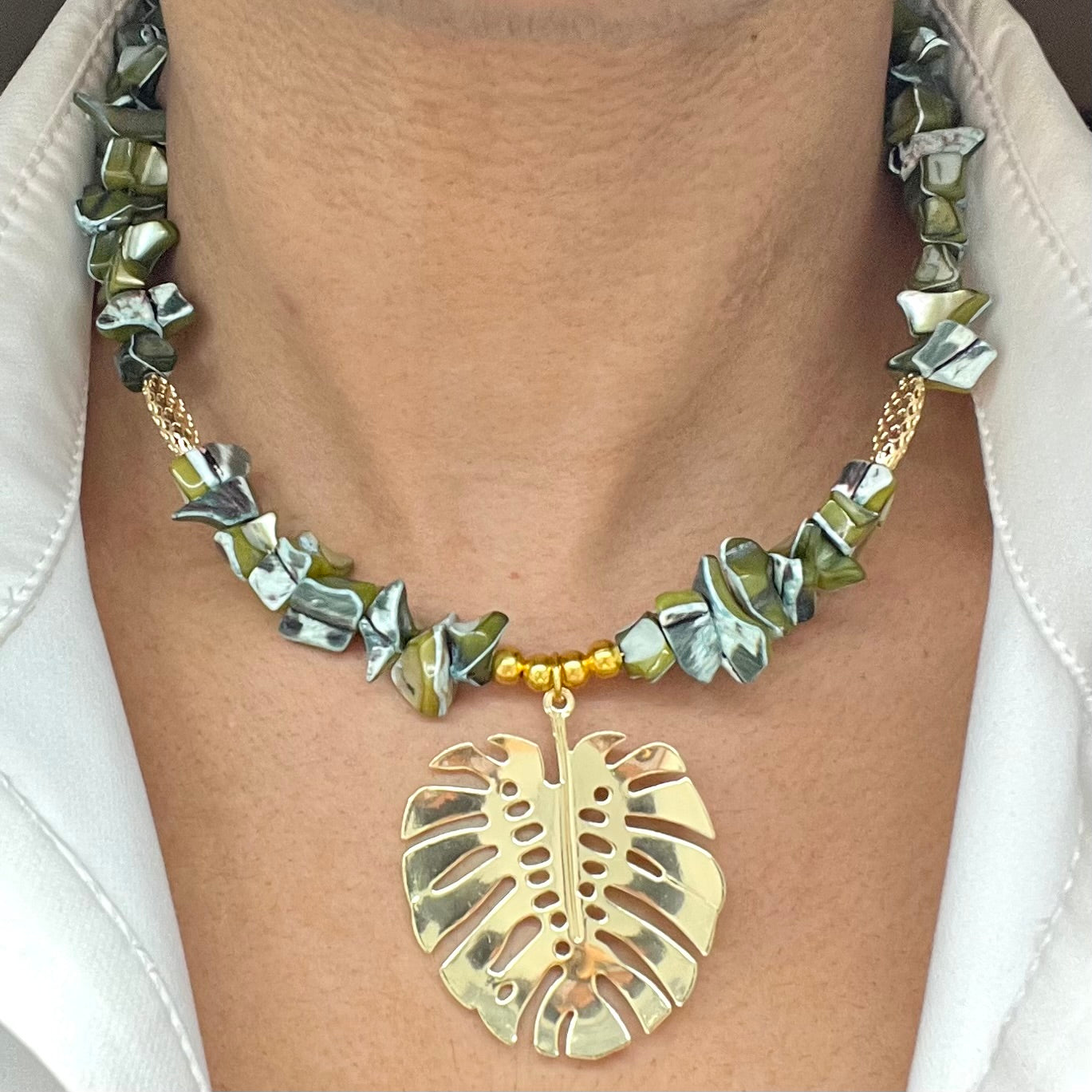 Green Chopped Beads Necklace And Gold Laminated Leaf Pendant