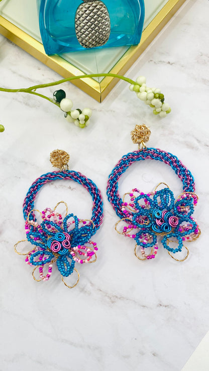 Gold wire embroidered circle with flower earring