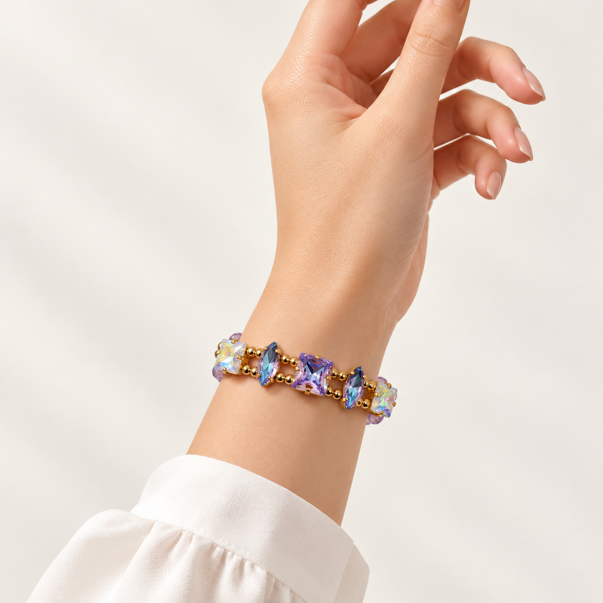 Czech bead bracelet with mixed square princess-cut and navette Swarovski crystals, shown on the wrist.
