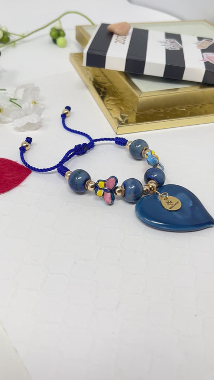 Ceramic Bead Bracelet With Ceramic Heart And Butterfly Pendant