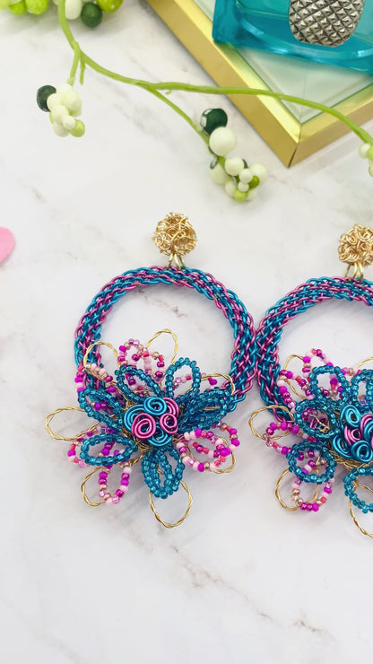 Gold wire embroidered circle with flower earring